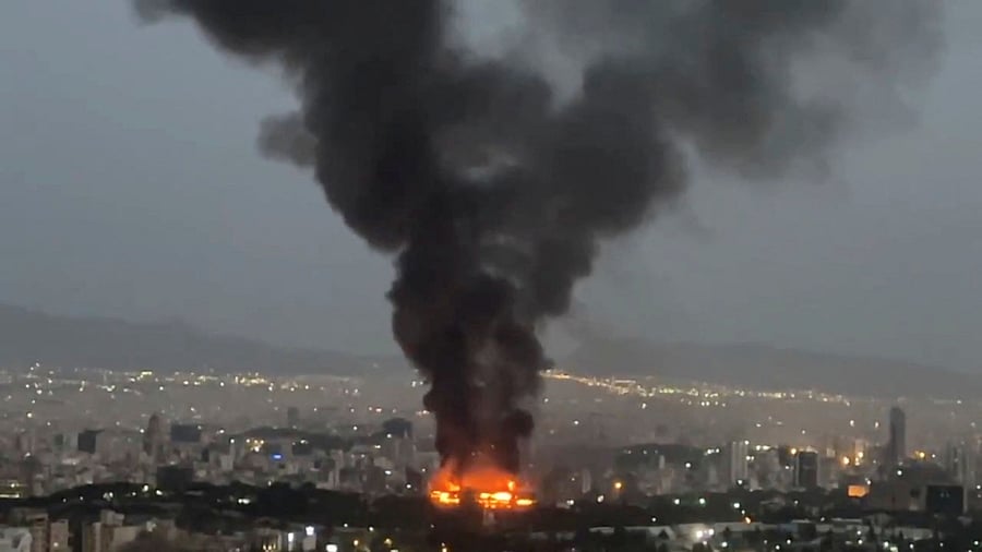 <div class="paragraphs"><p>Smoke rises from a fire, as the Israel-Iran air war continues, in Tehran, Iran, in this still image obtained from social media video released June 17, 2025. </p></div>
