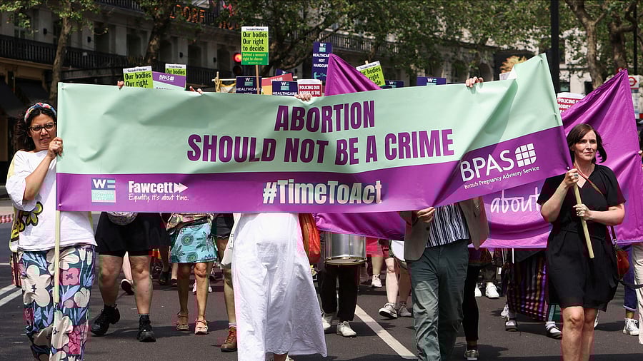 <div class="paragraphs"><p>People march during a protest calling for abortion law reform in London.</p></div>