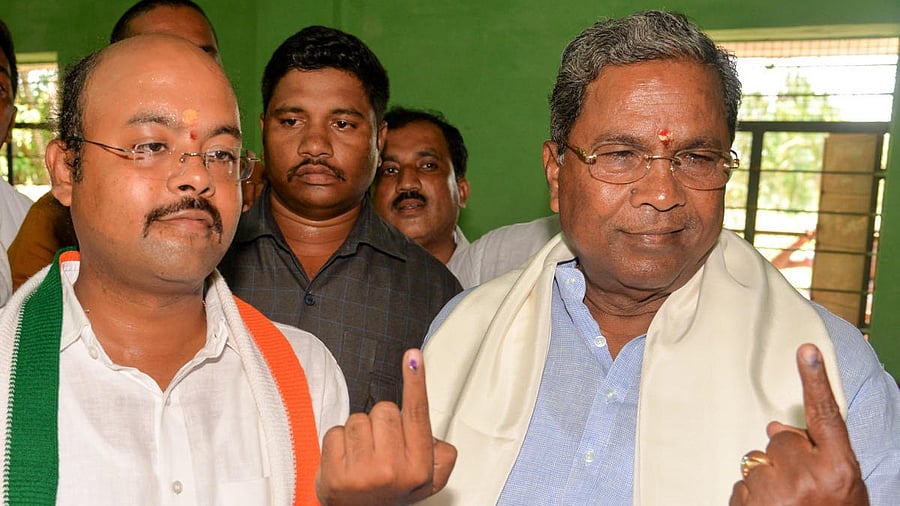 <div class="paragraphs"><p>CM Siddaramaiah and son Dr Yathindra.</p></div>