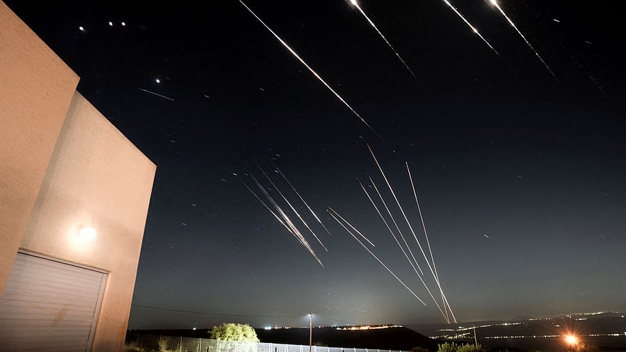 <div class="paragraphs"><p>Missiles launched from Iran are intercepted as seen from the Israeli-occupied Golan Heights, June 18, 2025.</p></div>