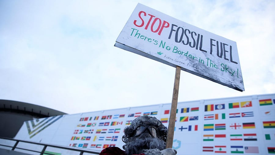 <div class="paragraphs"><p>An environmental activist protests against fossil fuel. For representational purposes.</p></div>