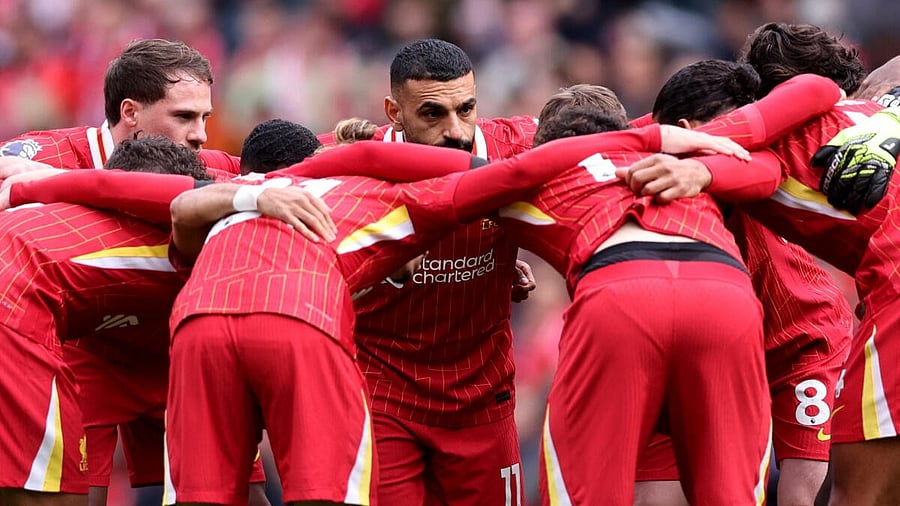 <div class="paragraphs"><p>Liverpool's Mohamed Salah with teammates in a huddle before the match. </p></div>