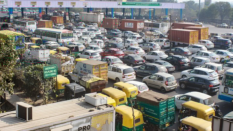 <div class="paragraphs"><p>FASTag fix&nbsp; Vehicles wait in long queues at a toll plaza on the first day of the implementation of the FASTag toll system, in Gurugram on Tuesday. </p></div>