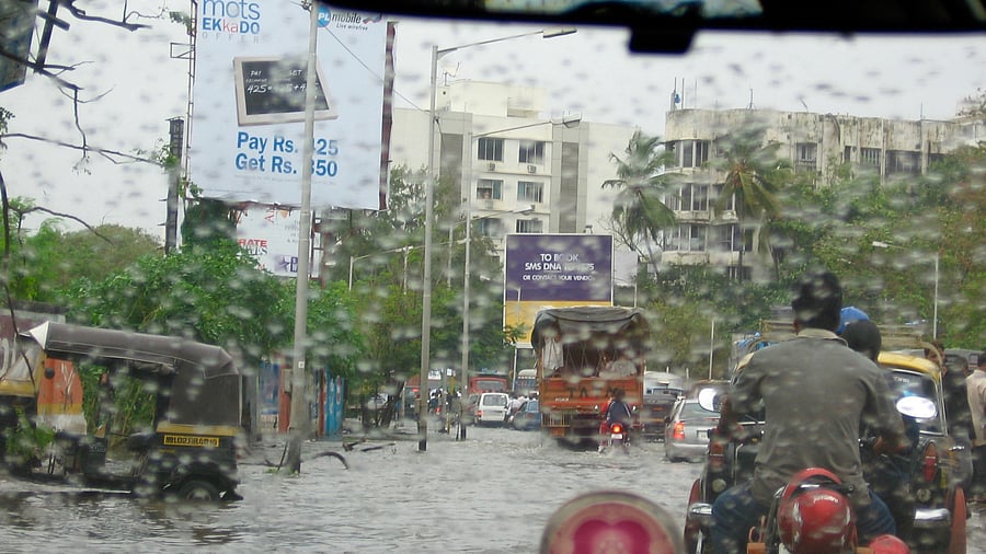 <div class="paragraphs"><p>A flooded road in India as seen through a car windshield. Image for representation.</p></div>