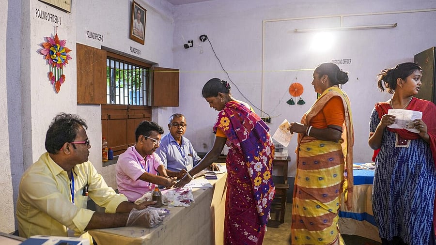 <div class="paragraphs"><p>A voter makes a thumb impression before casting vote at a polling booth during the by-election to the Kaliganj assembly seat in West Bengal's Nadia.&nbsp;</p></div>