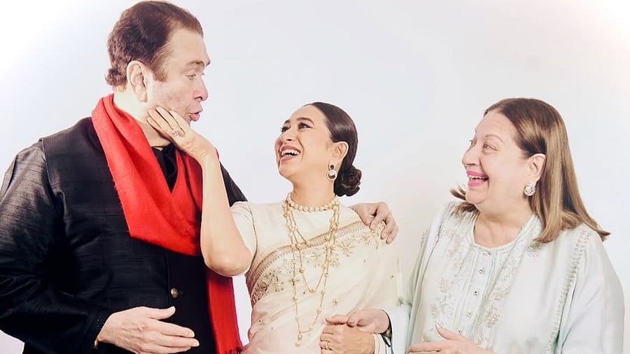 <div class="paragraphs"><p>Karisma Kapoor with her parents.</p></div>