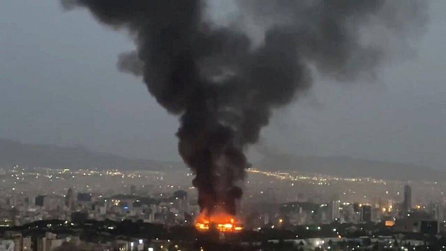 <div class="paragraphs"><p>Smoke rises from a fire, as the Israel-Iran air war continues, in Tehran, Iran, in this still image obtained from social media video released June 17, 2025.</p></div>