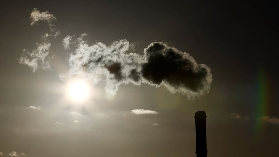<div class="paragraphs"><p> A view shows emissions from the smoke stack of a coal-fired power plant.</p></div>