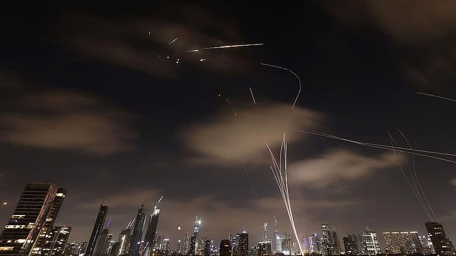 <div class="paragraphs"><p>Missiles launched from Iran are intercepted as seen from Tel Aviv, Israel, June 18, 2025.</p></div>