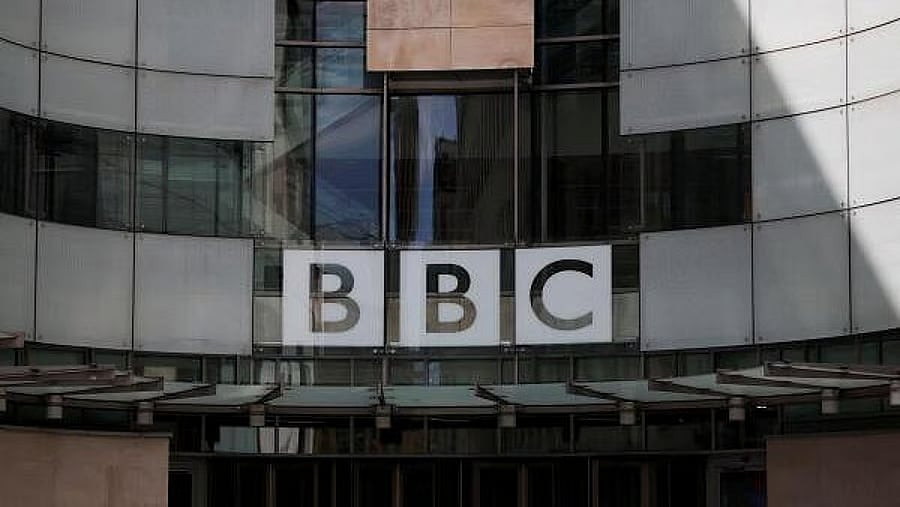 <div class="paragraphs"><p>The BBC logo is displayed above the entrance to the BBC headquarters in London, Britain.</p></div>