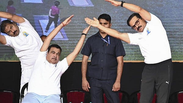 <div class="paragraphs"><p>Union Minister Nitin Gadkari and others perform yoga on the occasion of 11th ‘International Day of Yoga’, at Yashwant Stadium, in Nagpur.&nbsp;</p></div>