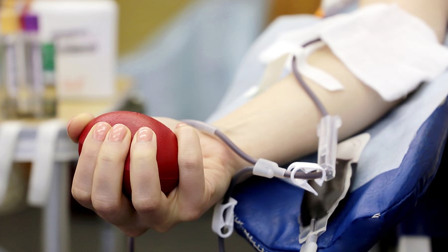 <div class="paragraphs"><p>A person donates blood at a camp. (Representative image)</p></div>