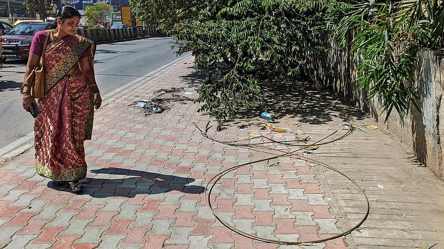 <div class="paragraphs"><p>The spot where a 23-year-old woman and her nine-month-old toddler died after the former stepped on a live electric wire near Hope Farm junction in Whitefield, Bengaluru.</p></div>