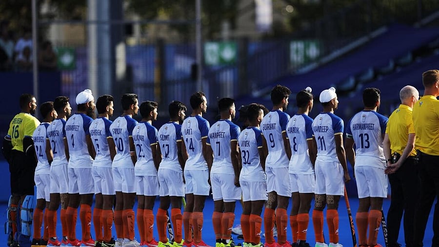 <div class="paragraphs"><p> Players of India line up during the national anthems before the match.</p></div>