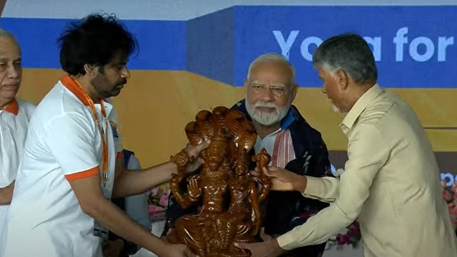 <div class="paragraphs"><p>In this screenshot from @NarendraModi via Youtube on June 21, 2025, Prime Minister Narendra Modi being felicitated by Andhra Pradesh Chief Minister N Chandrababu Naidu and Deputy CM Pawan Kalyan during 11th International Day of Yoga celebrations, in Visakhapatnam, Andhra Pradesh.</p></div>