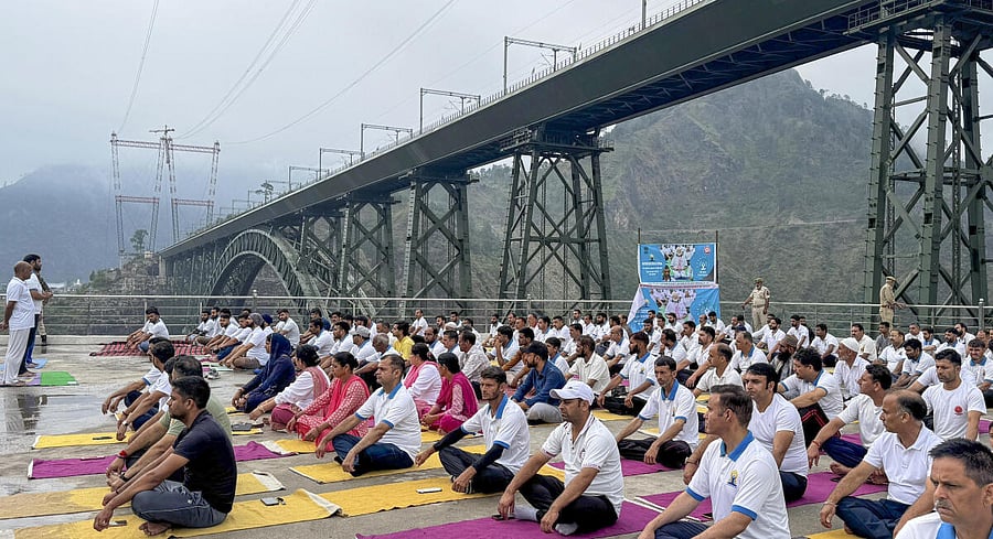 <div class="paragraphs"><p>People perform yoga on the occasion of ‘11th International Day of Yoga’.</p></div>