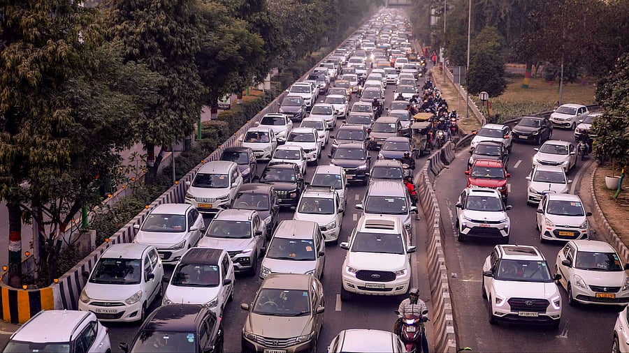 <div class="paragraphs"><p>Vehicles stuck in a traffic jam on a road near DND Flyway in Noida</p></div>