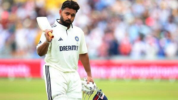 <div class="paragraphs"><p>Rishabh Pant walks after losing his wicket by LBW, off the bowling of England's Josh Tongue.&nbsp;</p></div>