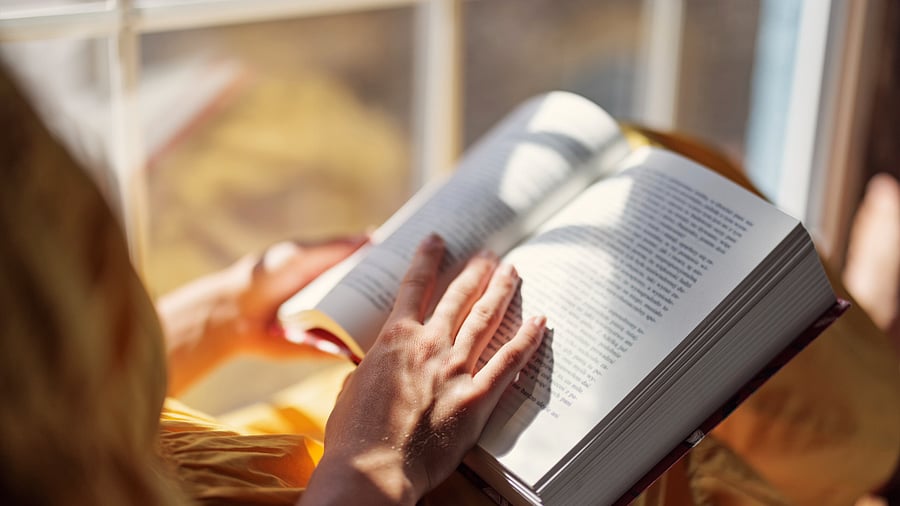 <div class="paragraphs"><p>Representative image showing a person reading a book</p></div>