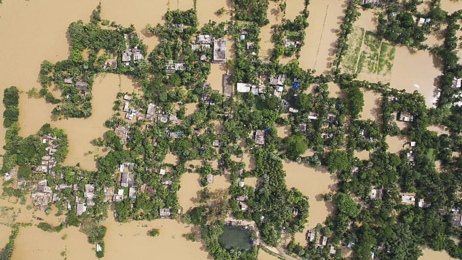 <div class="paragraphs"><p>A low-lying area flooded by water from swollen Subarnarekha river, at a village in Balasore district, Odisha, Saturday, June 21, 2025.</p></div>