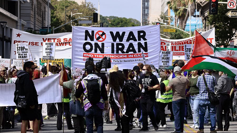<div class="paragraphs"><p>A "No war on Iran" banner is held as people attend an anti-war demonstration in Los Angeles, California.</p></div>
