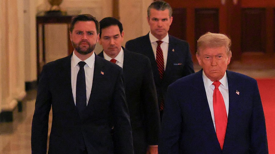 <div class="paragraphs"><p>US President Donald Trump walks accompanied by US Vice President JD Vance</p></div>