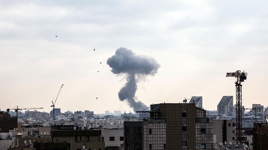 <div class="paragraphs"><p>Smoke can be seen as during a missile attack from Iran on Israel, amid the Iran-Israel conflict, in Tel Aviv, Israel, June 22, 2025.</p></div>