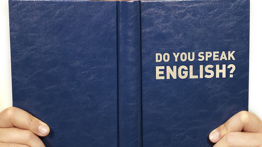 <div class="paragraphs"><p>Representative image showing a person read 'Do you speak English'</p></div>