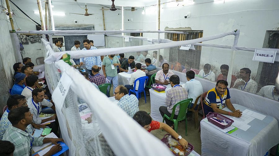 <div class="paragraphs"><p>In this image released by @CEOWestBengal via X on June 23, 2025, polling officials at a counting centre during counting of votes for Kaliganj Assembly constituency by-elections.</p></div>