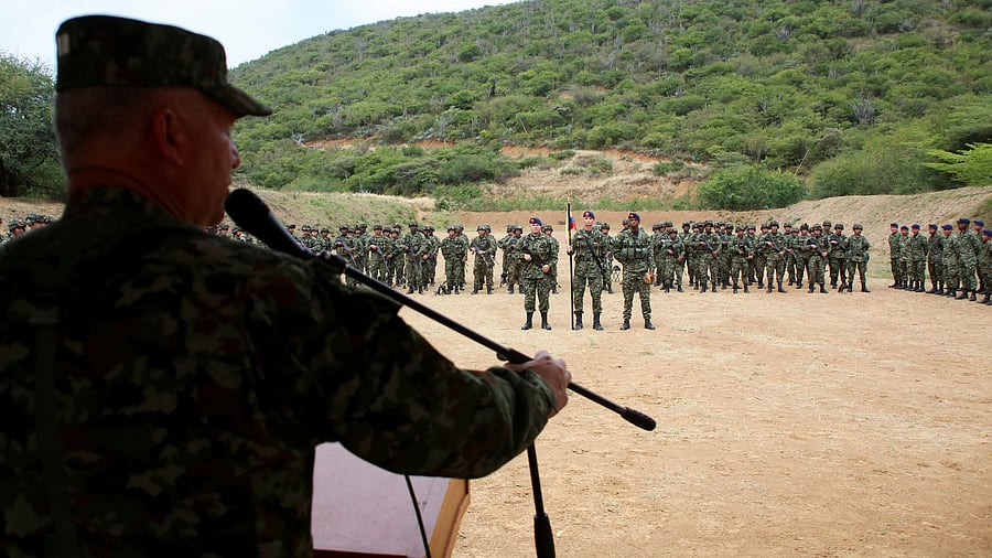 <div class="paragraphs"><p>Colombian soldiers stand in formation </p></div>