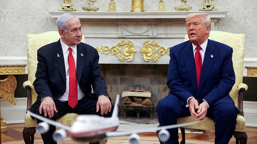 <div class="paragraphs"><p>US President Donald Trump talks to Israeli Prime Minister Benjamin Netanyahu during a meeting </p></div>