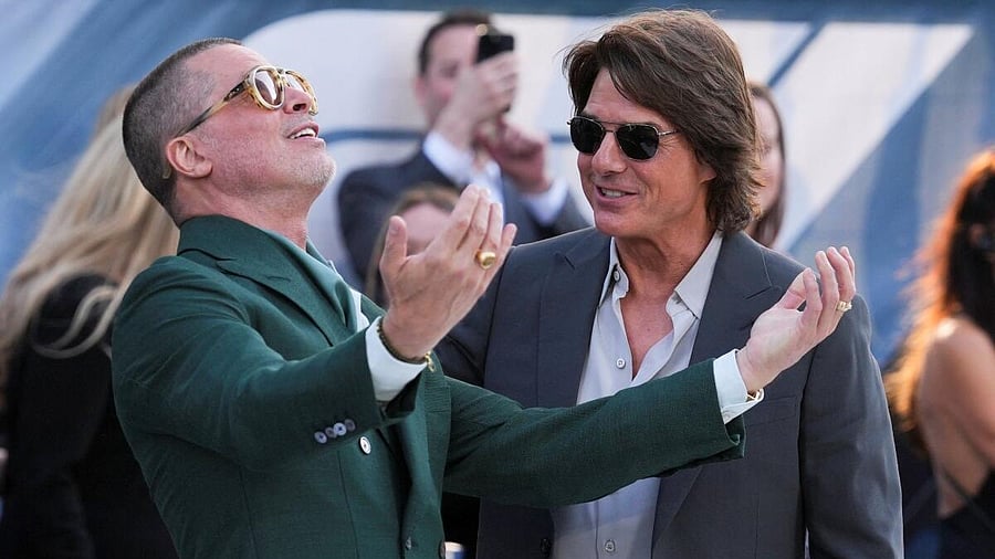 <div class="paragraphs"><p>Brad Pitt and actor Tom Cruise attend the "F1: The Movie" European premiere in London, Britain, June 23, 2025.</p></div>