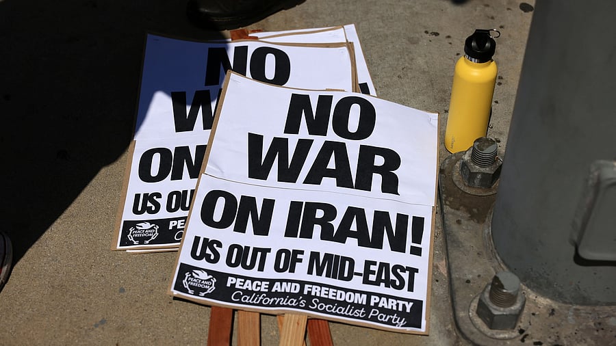<div class="paragraphs"><p>Placards are laid on the ground as demonstrators protest against the United States joining with Israel in attacks on Iran's nuclear facilities, at a federal building in Los Angeles, California, US, June 22, 2025.</p></div>