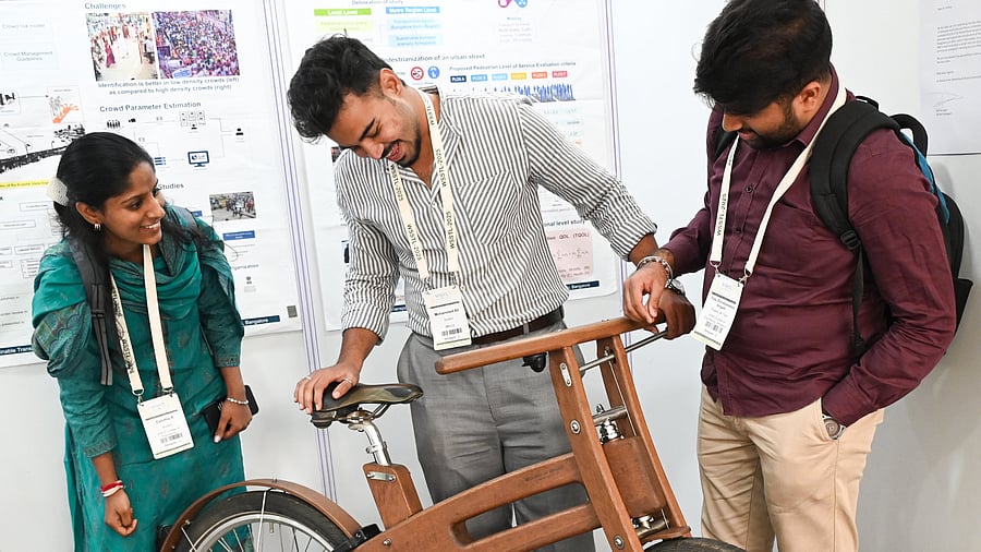 <div class="paragraphs"><p>Visitors look at a 'Bough Bike' from the Netherlands at the exhibition at the Indian Institute of Science (IISc) in Bengaluru on Wednesday. </p></div>