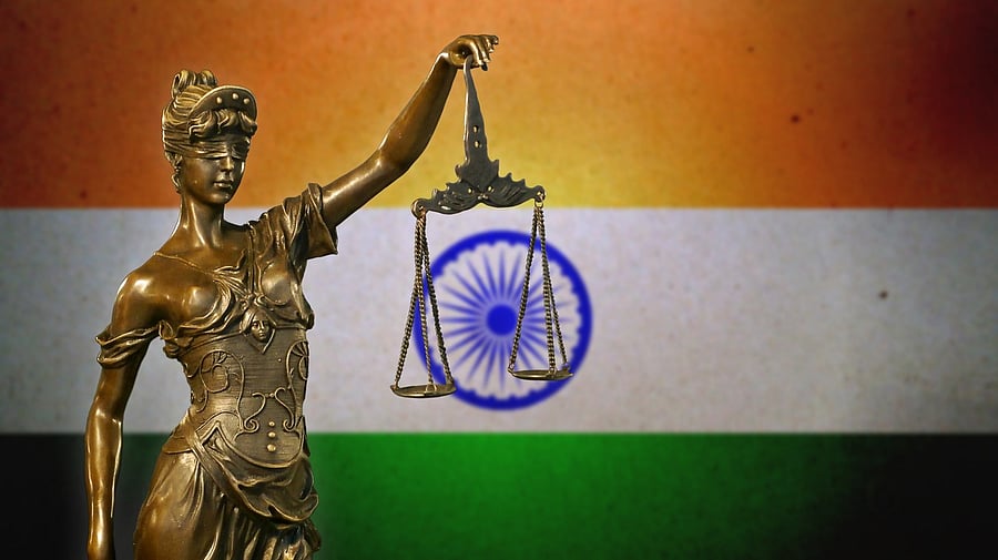 <div class="paragraphs"><p>Image showing Lady Justice and the Indian flag. For representational purposes.</p></div>