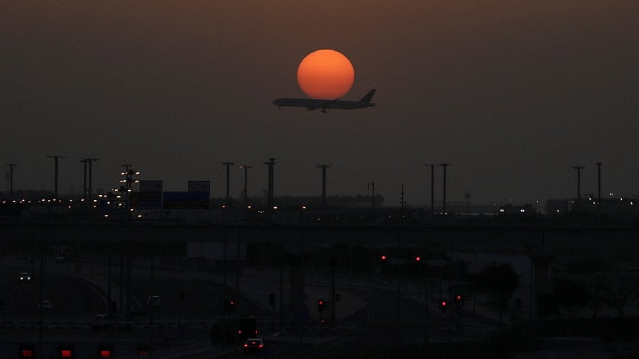 <div class="paragraphs"><p>A passenger plane flies during sunrise as seen from Al Thumama, after Qatar reopened its airspace after a brief suspension, following Monday's missile attack on Al Udeid Air Base by Iran, Qatar, June 24, 2025.</p></div>