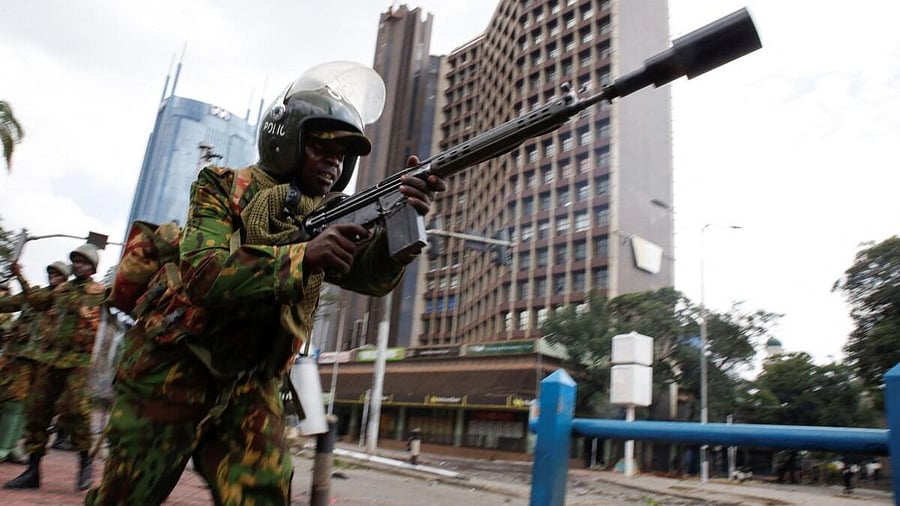 <div class="paragraphs"><p>A riot police officer prepares to lob a teargas canister to disperse protestors during demonstrations to mark the first anniversary of the deadly 2024 anti-government protests that drew widespread condemnation over the use of force by security agencies, in Nairobi, Kenya</p></div>