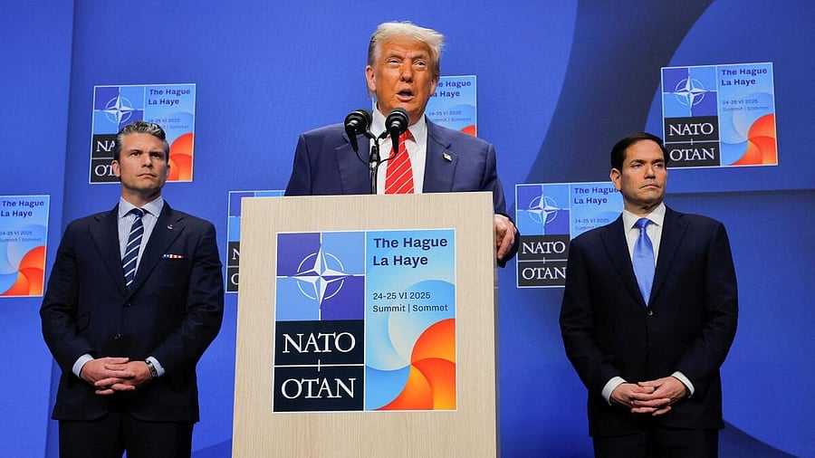 <div class="paragraphs"><p>US President Donald Trump speaks at a press conference, as Secretary of Defense Pete Hegseth and Secretary of State Marco Rubio stand</p></div>