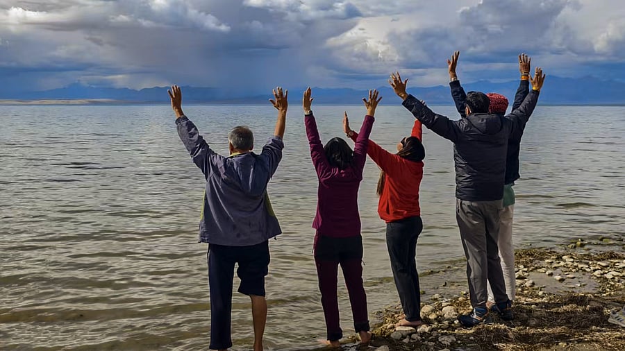 <div class="paragraphs"><p> In this handout image released by the Chinese Embassy on June 26, 2025, the first batch of Indian pilgrims at the Manasarovar Lake, in Tibet.</p></div>