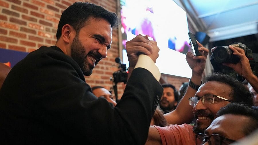 <div class="paragraphs"><p>Zohran Mamdani greets a supporter during his election campaign.&nbsp;</p></div>