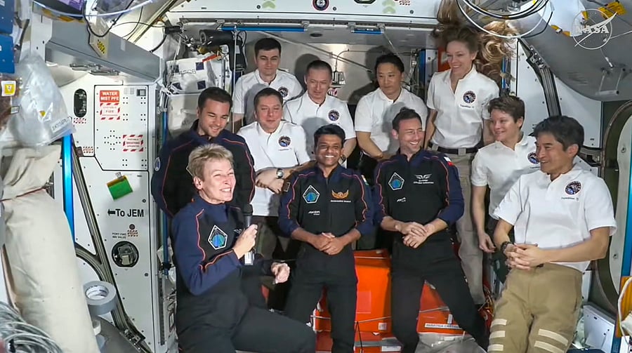 <div class="paragraphs"><p>In this Nasa screengrab, Shubhanshu Shukla with three other astronauts and ISS crew after the Axiom-4 mission's Space-X Dragon spacecraft docked to the ISS. </p></div>