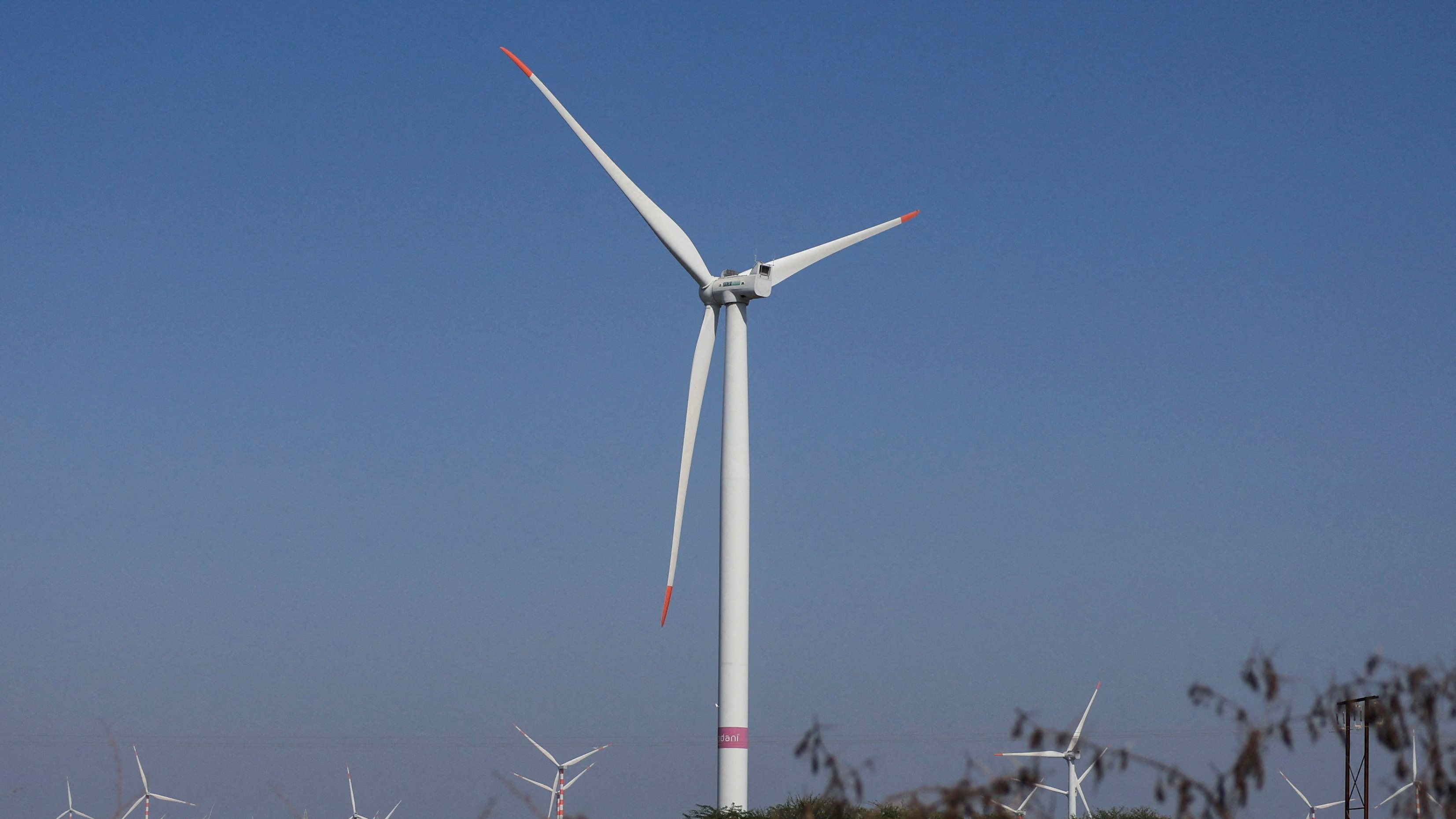 <div class="paragraphs"><p>A view of power-generating windmill turbines at a wind park.</p></div>