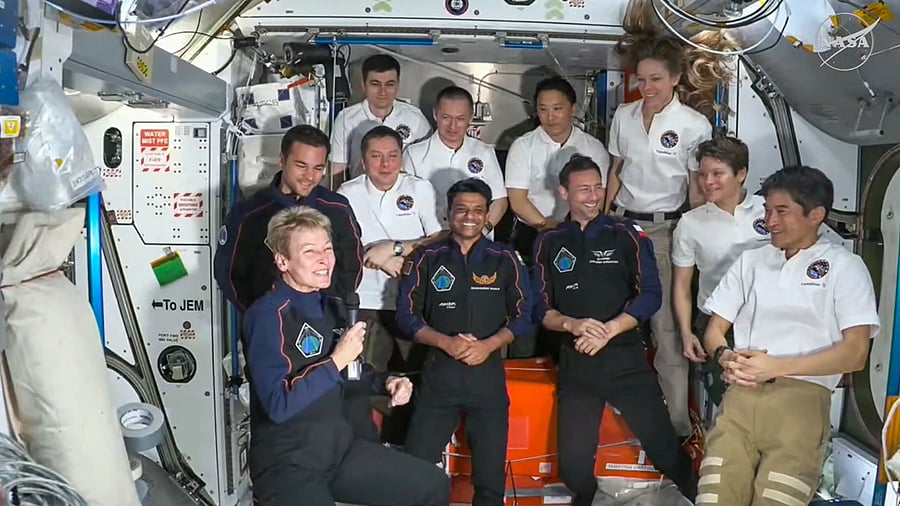 <div class="paragraphs"><p>In this Nasa screengrab, Shubhanshu Shukla with three other astronauts and ISS crew after the Axiom-4 mission's Space-X Dragon spacecraft docked to the ISS. </p></div>