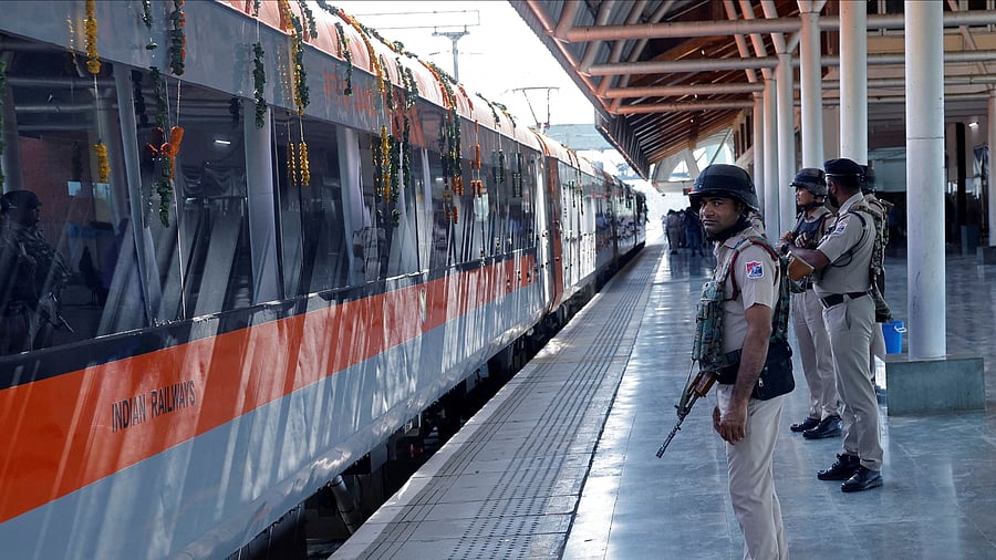 Security force personnel stand guard as India's high-speed train "Vande Bharat Express" arrives at Srinagar railway station after India's Prime Minister Narendra Modi flagged off the train services from the Shri Mata Vaishno Devi  railway station in Jammu's Katra to Srinagar, June 6, 2025. REUTERS/Sharafat Ali