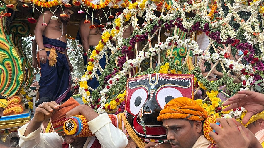 Devotees pulling the chariot of Lord Jagannath at the rath yatra in Jigani temple.