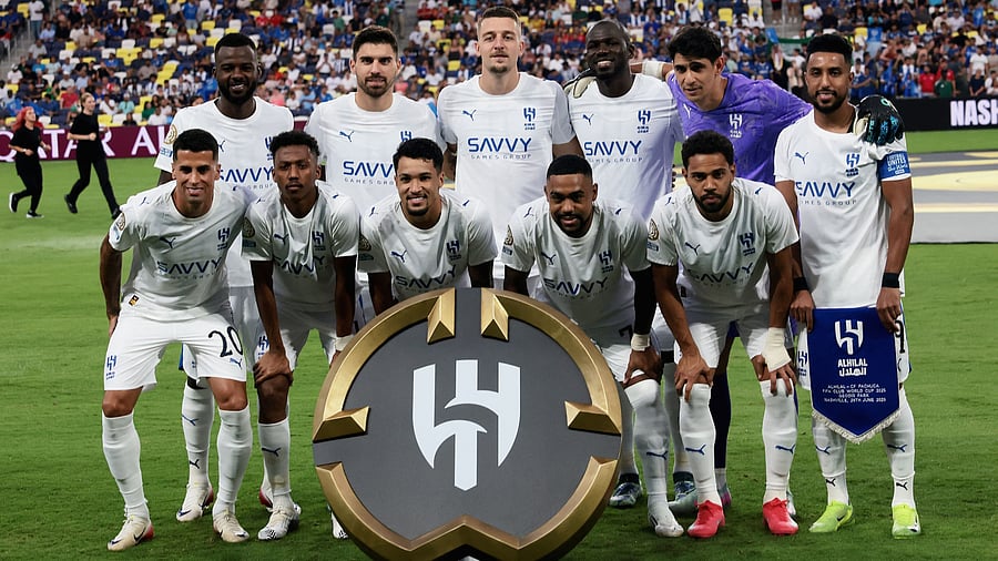 <div class="paragraphs"><p>Al Hilal's players pose for a team group photo before the match.</p></div>