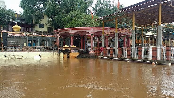 The Datta Mandir on the confluence of swollen Krishna and Panchaganga rivers near Narsinhwadi is submerged.
