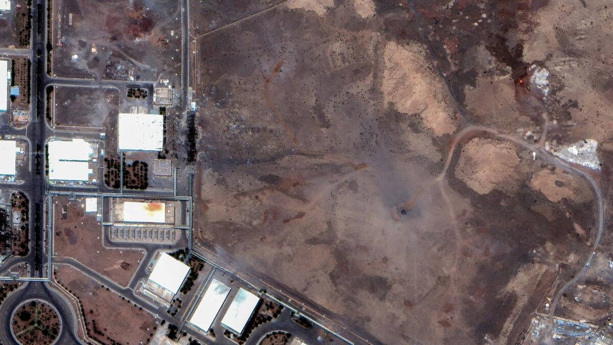 <div class="paragraphs"><p>A satellite image shows airstrike craters over the underground centrifuge halls of the Natanz Enrichment Facility</p></div>