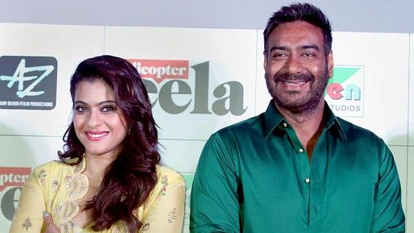 <div class="paragraphs"><p>Bollywood actress Kajol Devgn with her husband actor Ajay Devgn (R).</p></div>