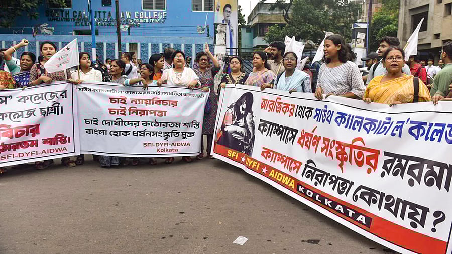 <div class="paragraphs"><p>Members of SFI-DYFI-AIDWA protest after a 24-year-old first-year student of a law college was gang-raped inside the institution allegedly by an alumnus and its two senior students, in Kolkata, West Bengal, Friday, June 27, 2025.</p></div>